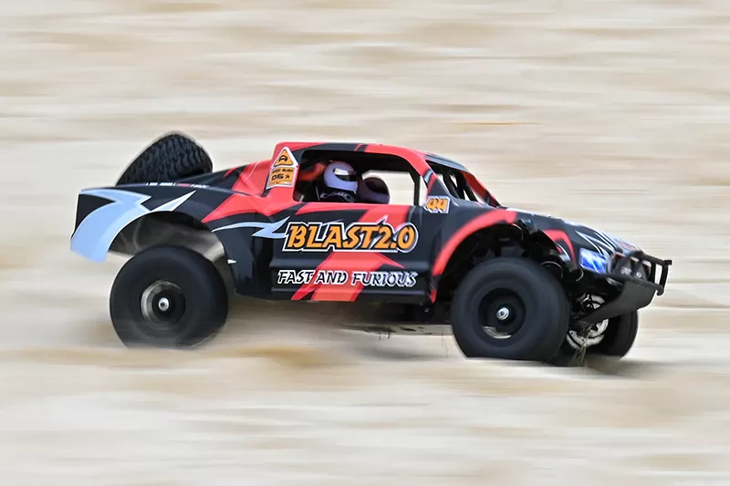 Caminhão elétrico off-road de 10 escalas 4WD de curta distância 2.4G escovado de alta velocidade RTR # RH1043SC