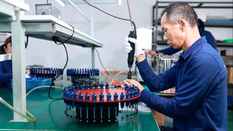 Equipe de produção de peças de reposição